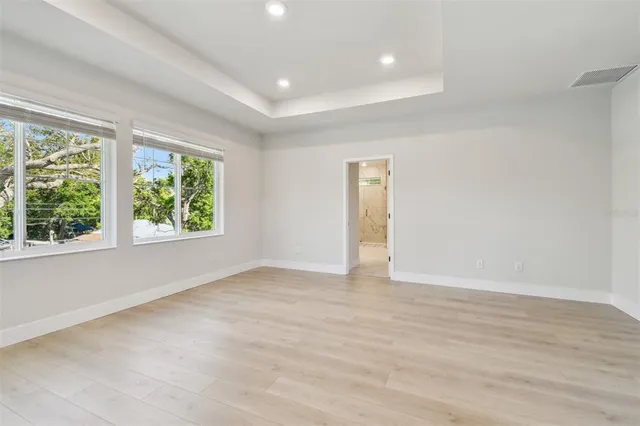 a bathroom with a double vanity sink mirror and double
