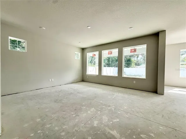 a view of a hallway with staircase
