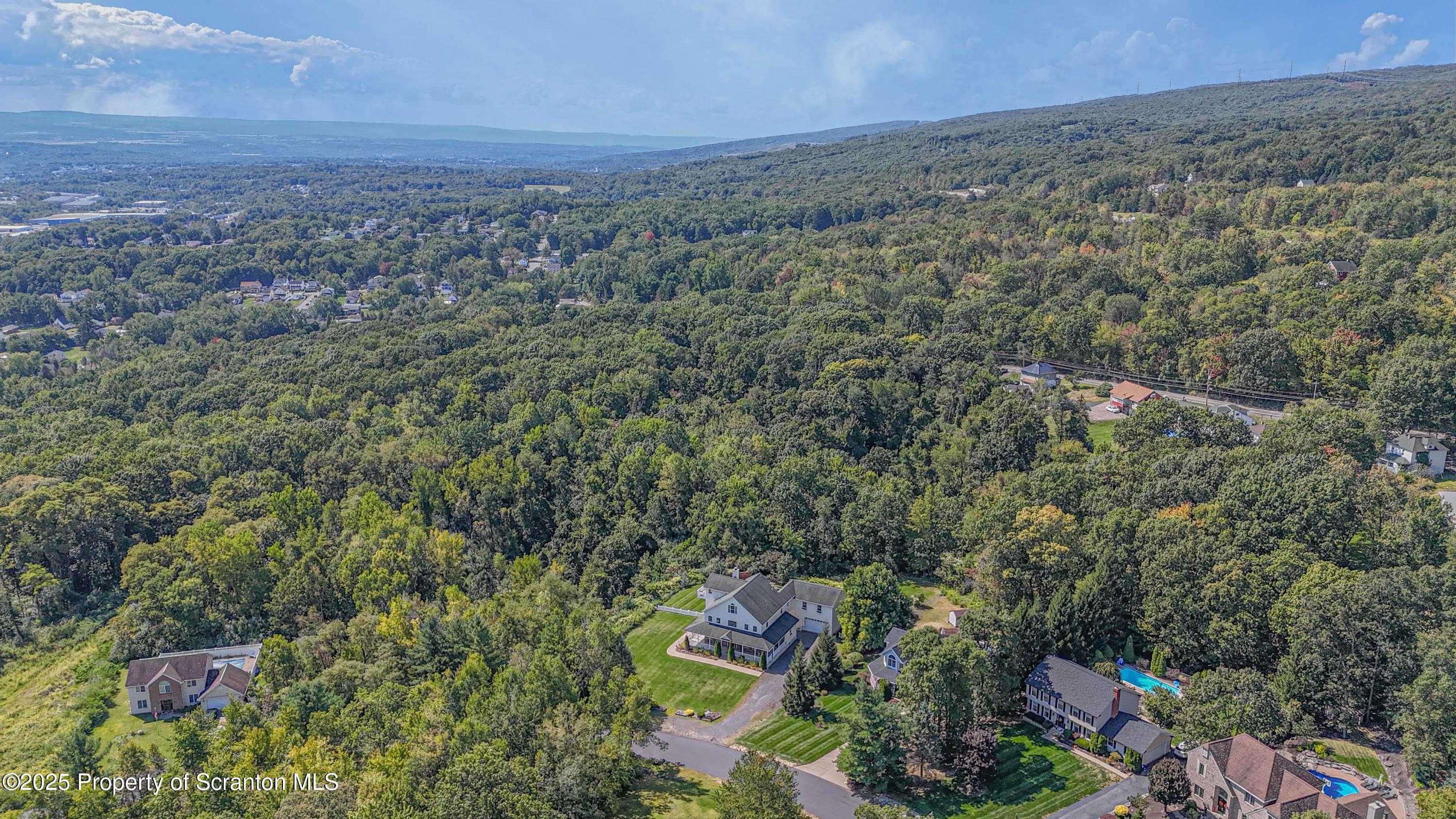 107 Ridgeview Drive Scranton, PA 18504 - Photo 12 of 48 an aerial view of houses with yard