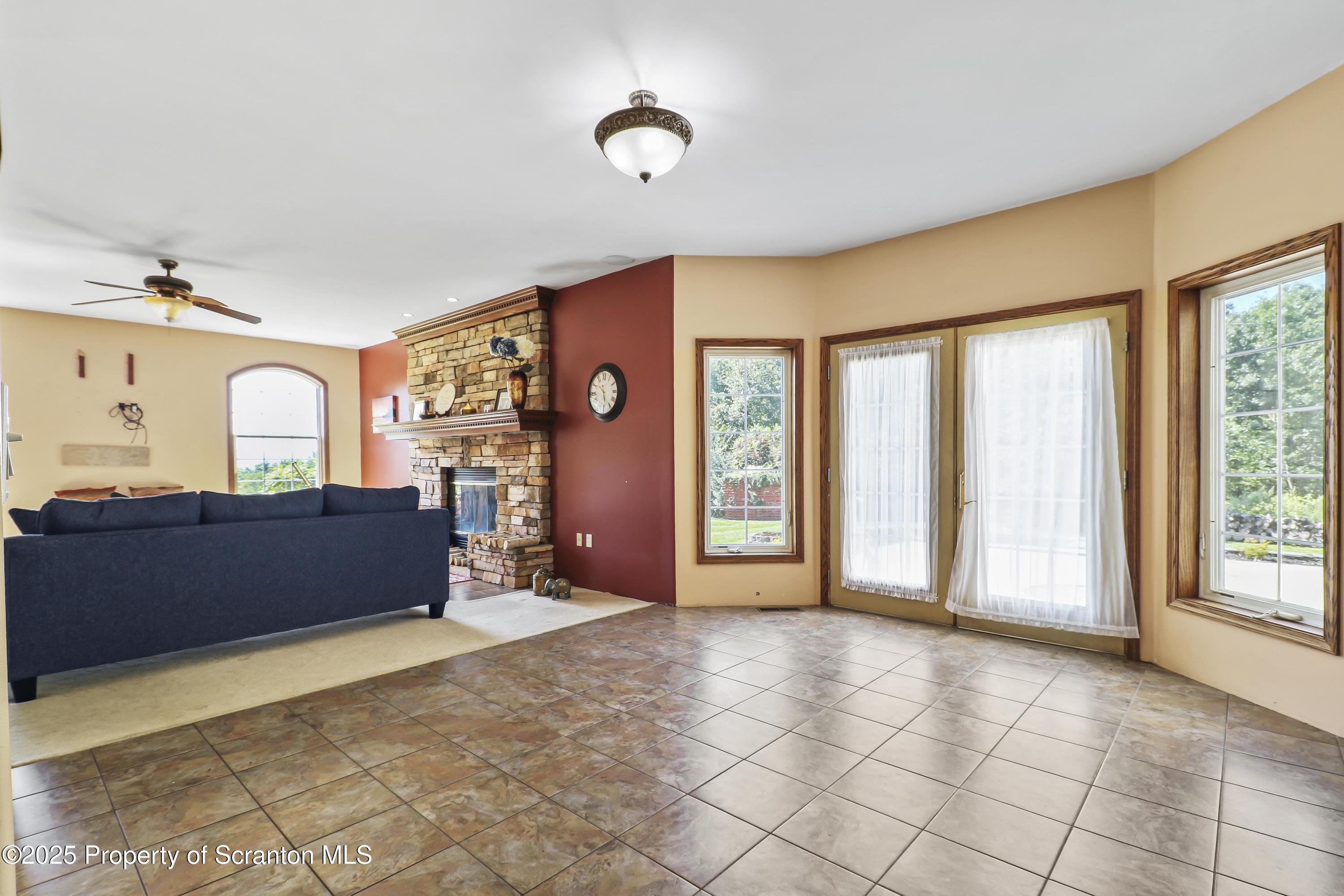 107 Ridgeview Drive Scranton, PA 18504 - Photo 15 of 48 a living room with furniture and a window