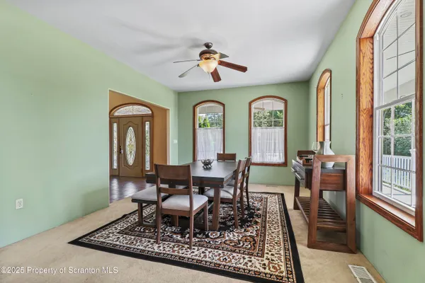a view of a livingroom with furniture and window