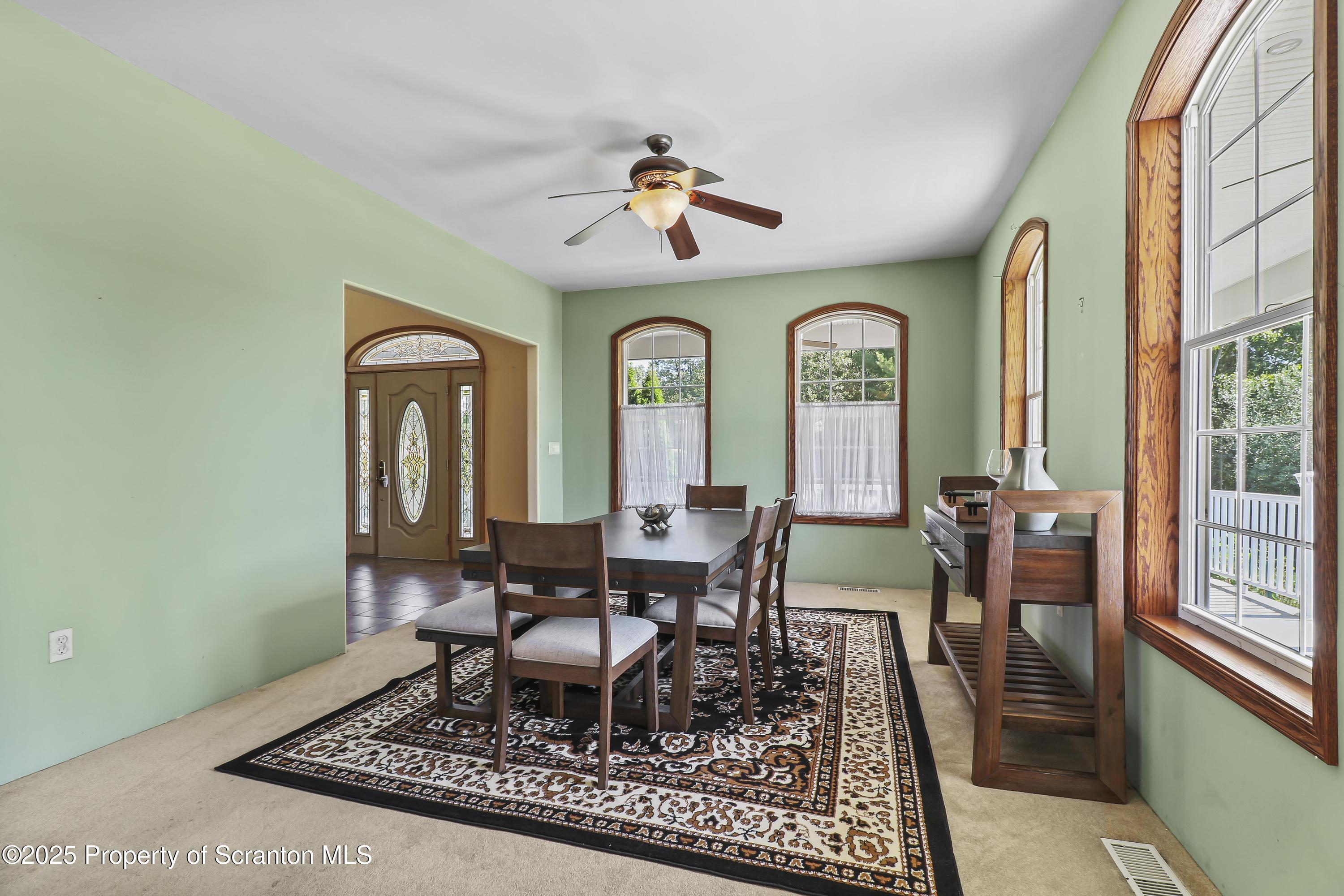 107 Ridgeview Drive Scranton, PA 18504 - Photo 19 of 48 a view of a livingroom with furniture and window