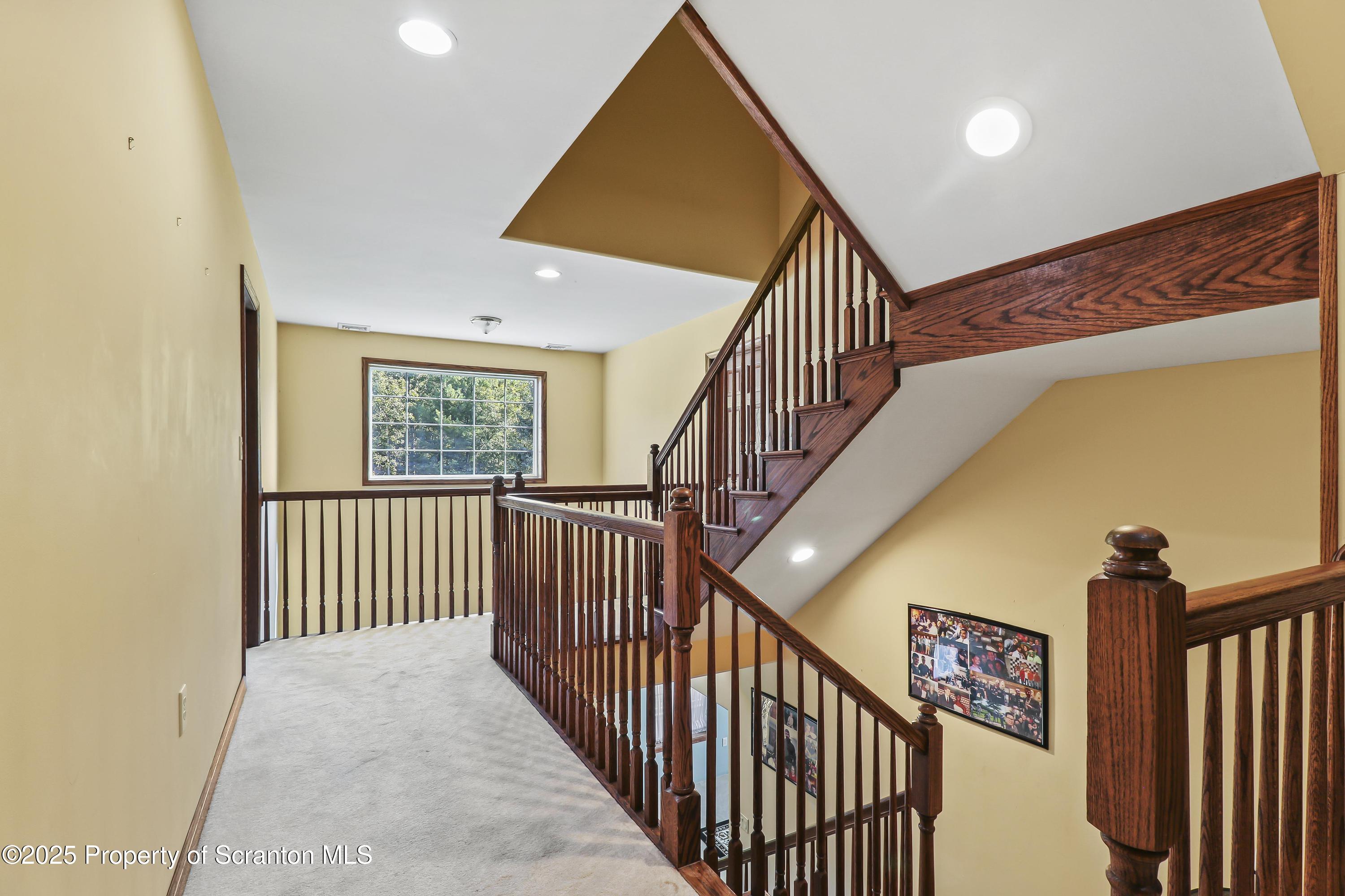107 Ridgeview Drive Scranton, PA 18504 - Photo 25 of 48 a view of staircase with railing and a window