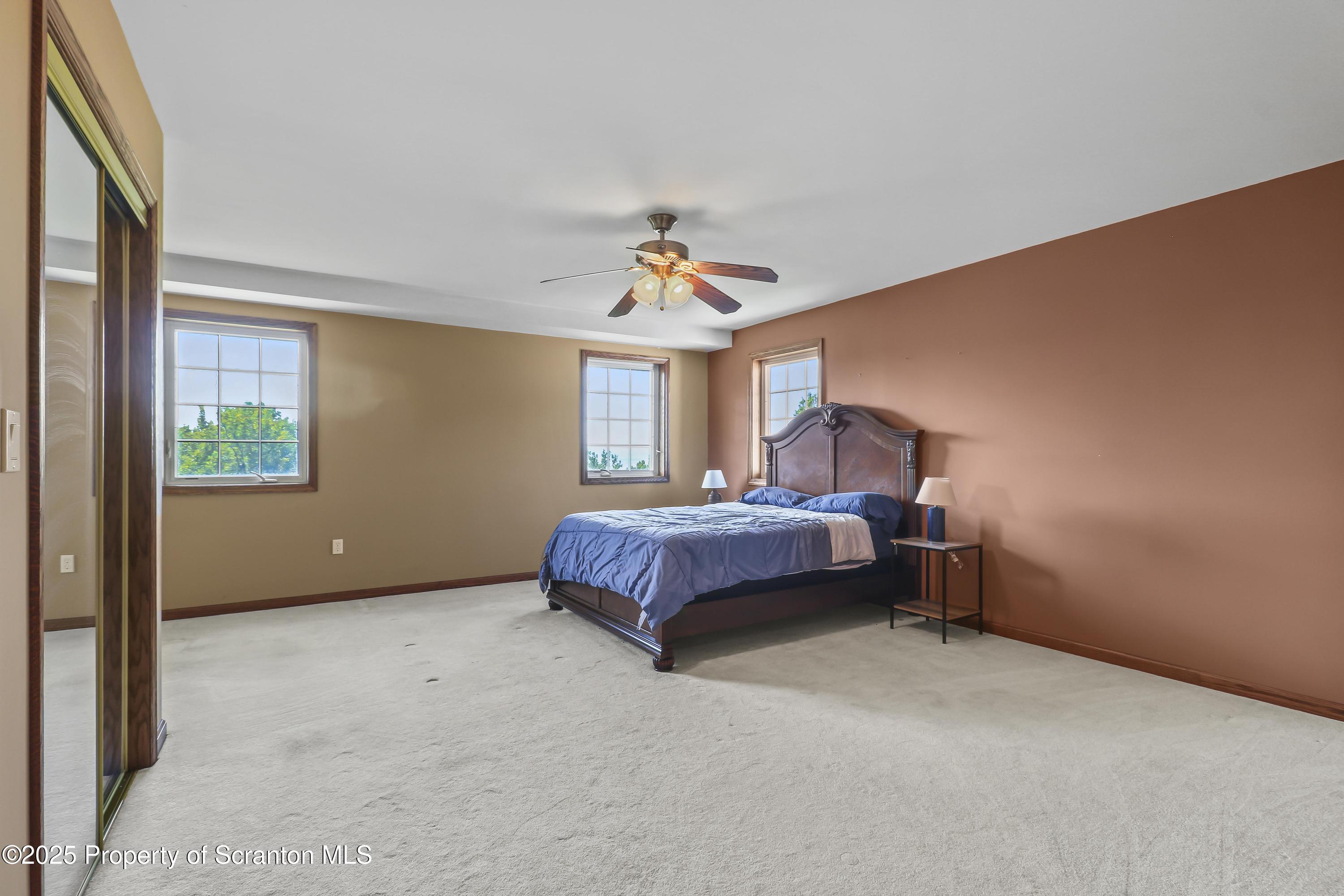 107 Ridgeview Drive Scranton, PA 18504 - Photo 27 of 48 a bed room with a bed and a window