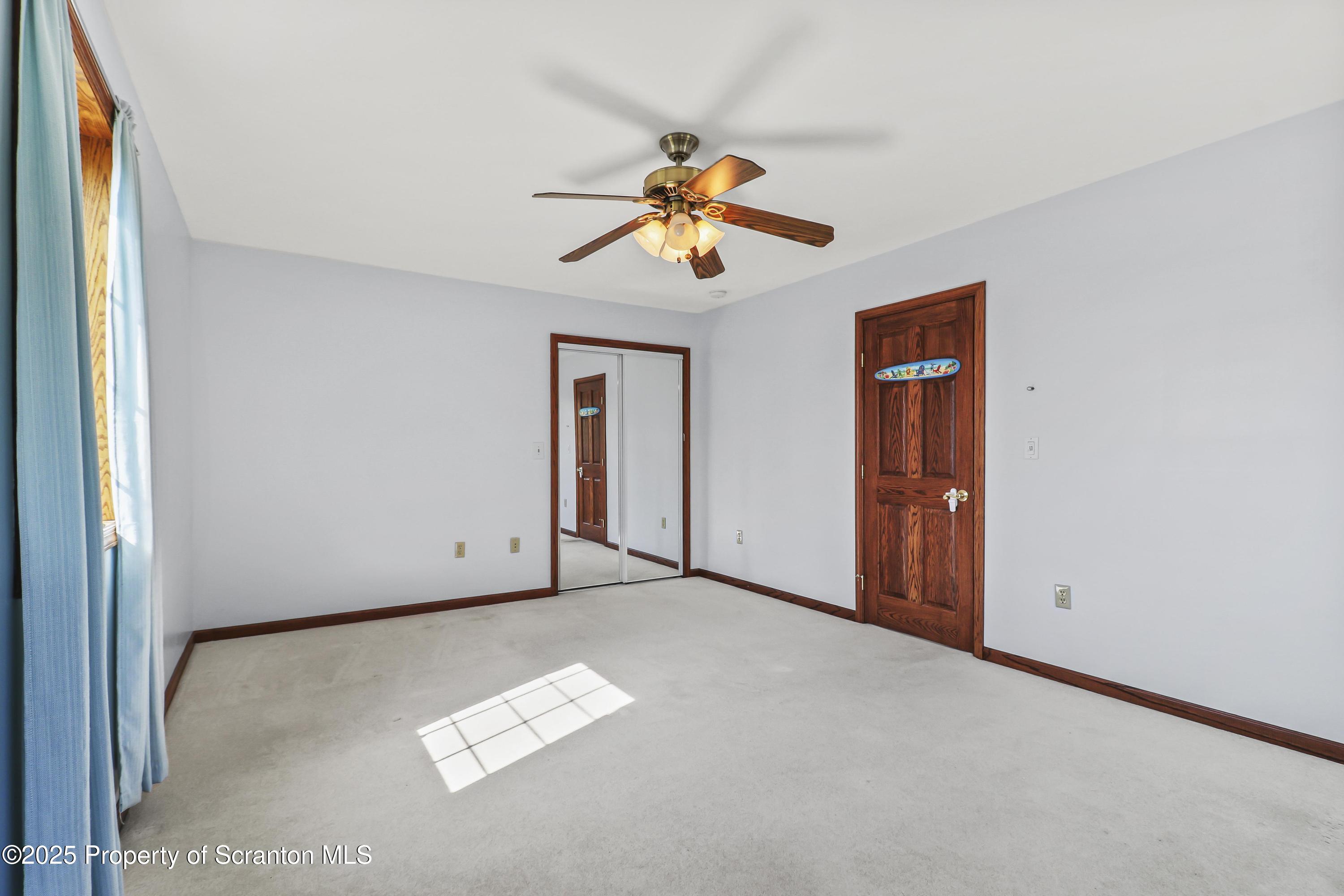 107 Ridgeview Drive Scranton, PA 18504 - Photo 32 of 48 a view of a ceiling fan in a room