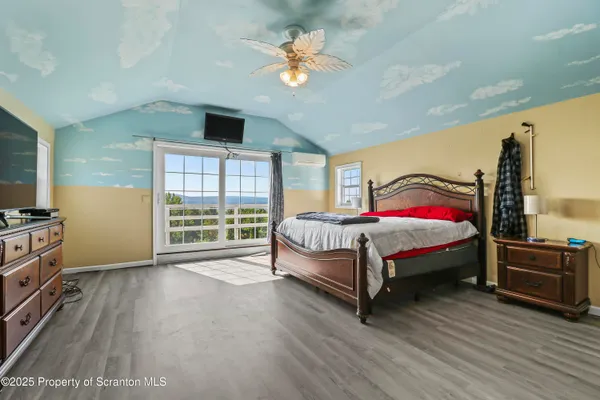 a room with furniture and wooden floor