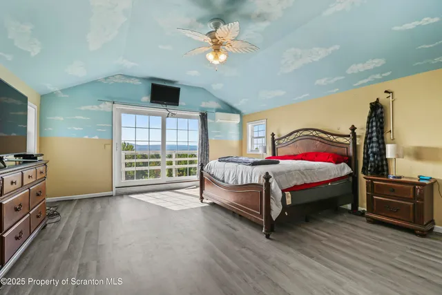 a room with furniture and wooden floor