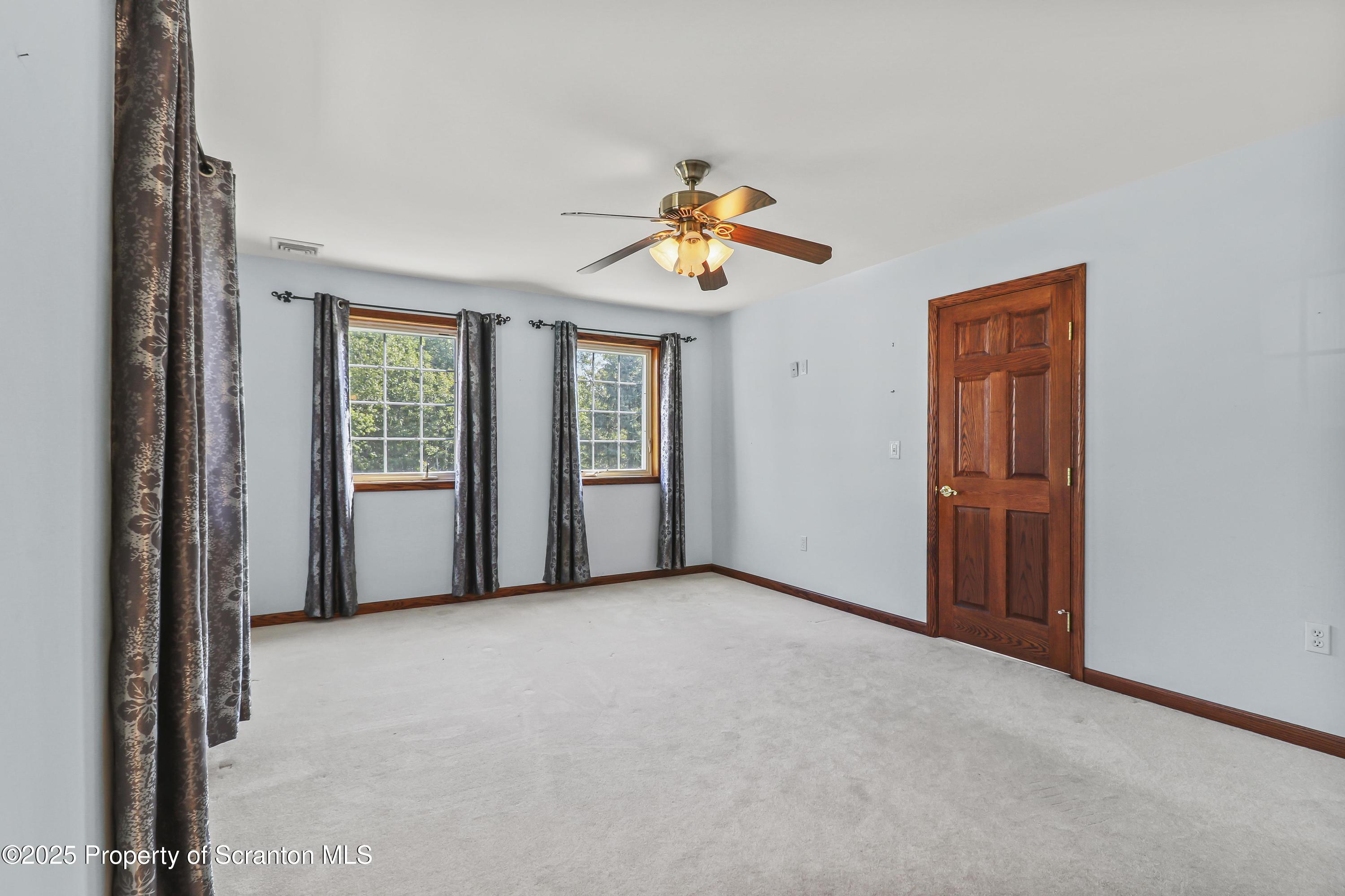 107 Ridgeview Drive Scranton, PA 18504 - Photo 41 of 48 an empty room that has a window and kitchen view