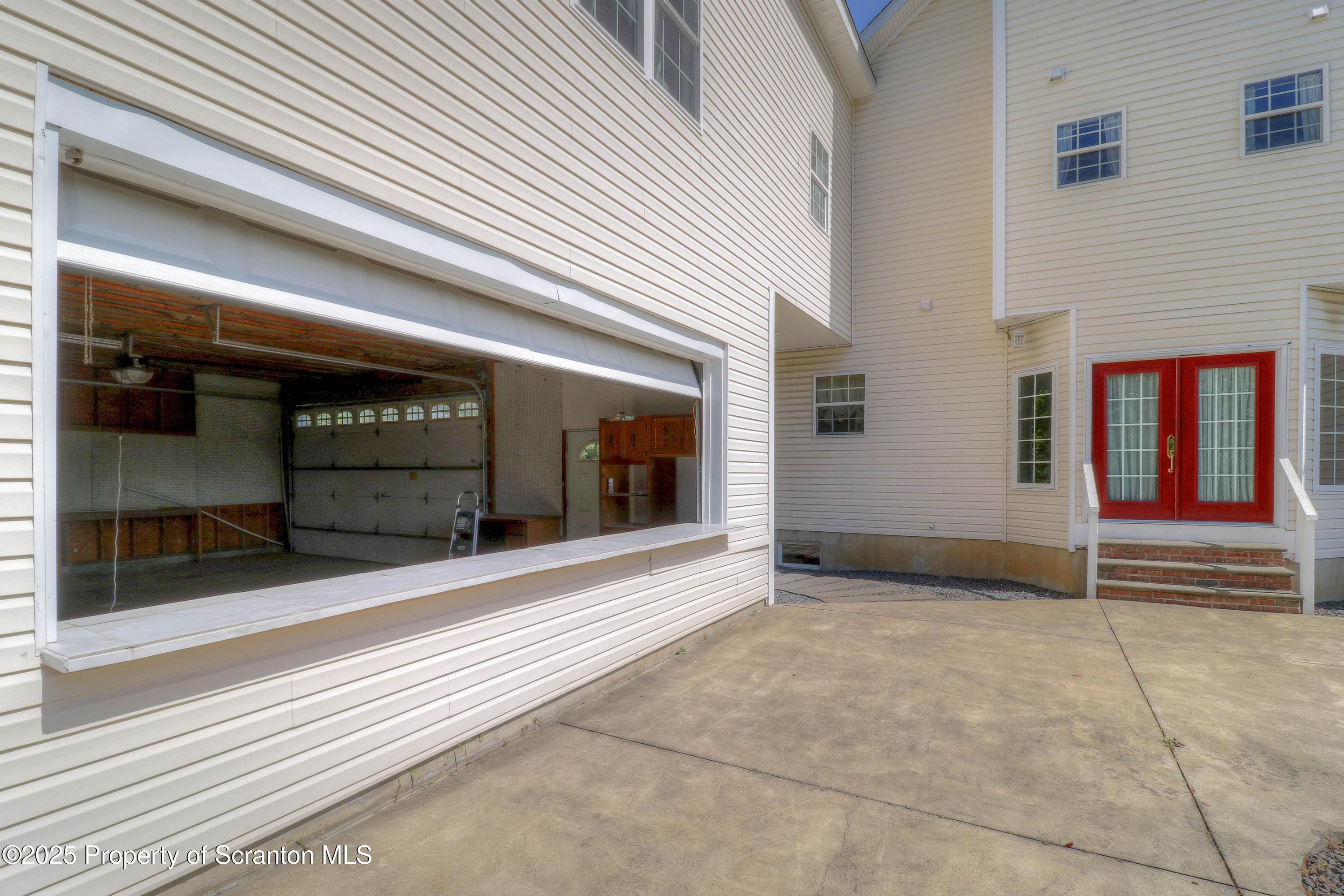 107 Ridgeview Drive Scranton, PA 18504 - Photo 6 of 48 a view of a building entrance