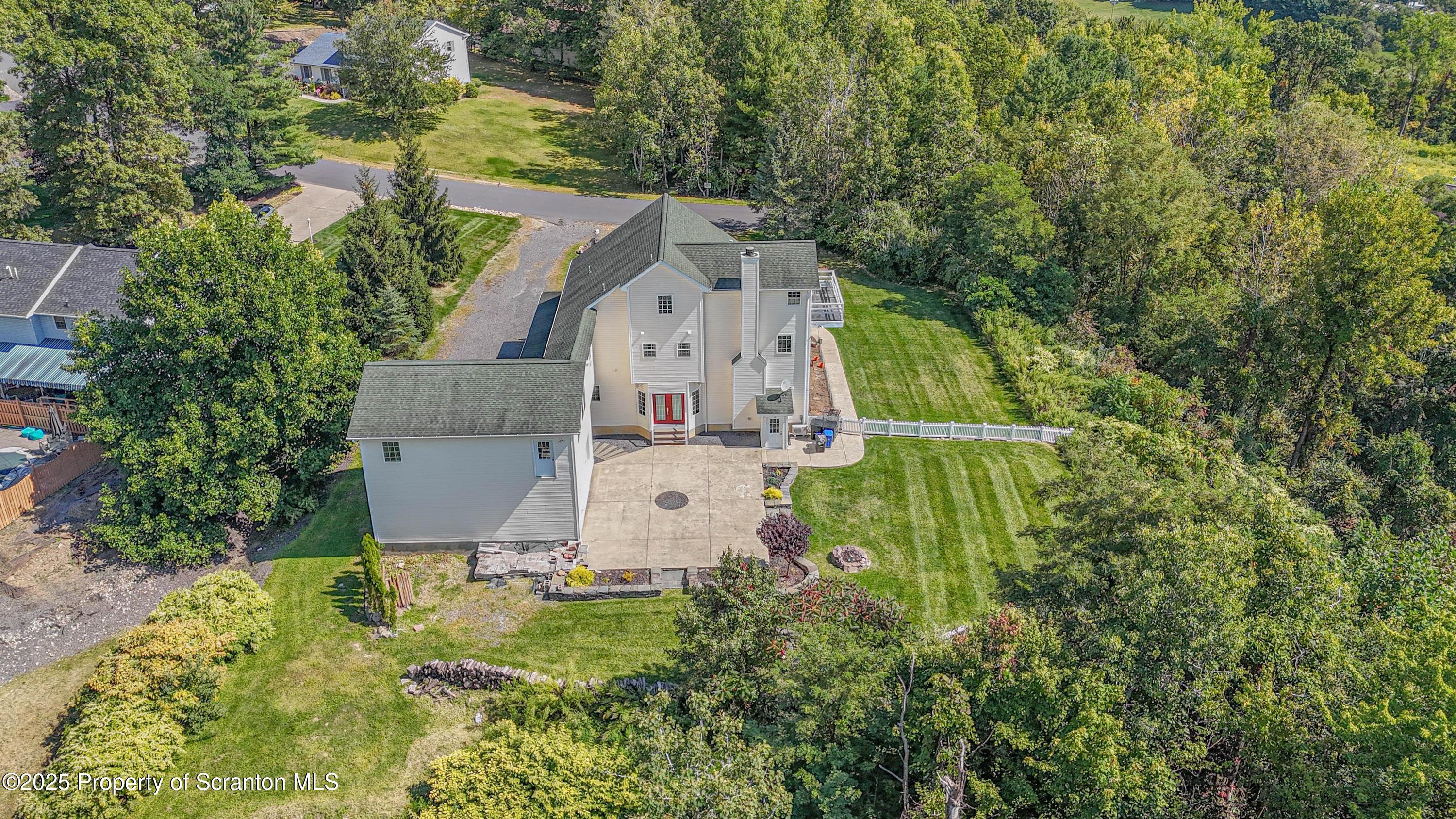 107 Ridgeview Drive Scranton, PA 18504 - Photo 9 of 48 an aerial view of residential house with outdoor space and trees all around