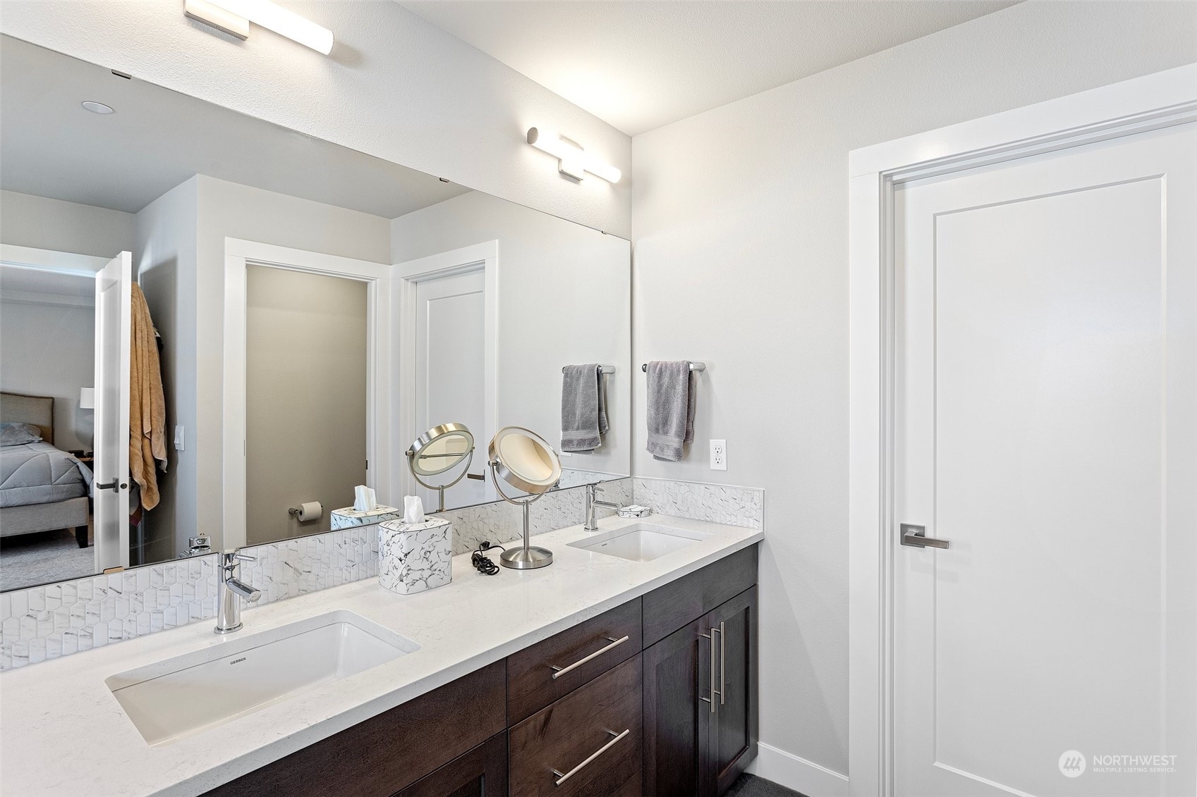 2124 229th Place Southwest Bothell, WA 98021 - Photo 14 of 37 a bathroom with a double vanity sink and a mirror