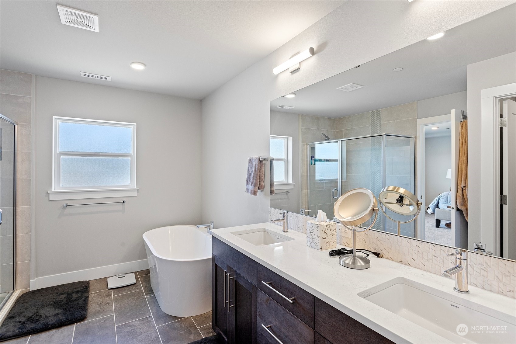 2124 229th Place Southwest Bothell, WA 98021 - Photo 15 of 37 a bathroom with a sink and a mirror