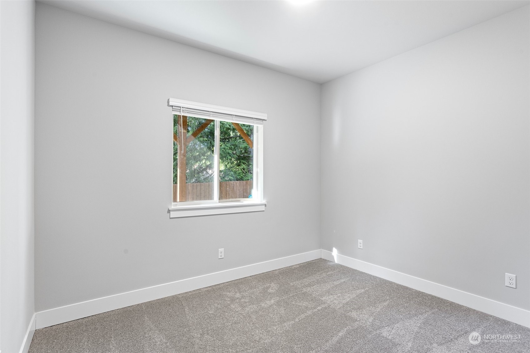 2124 229th Place Southwest Bothell, WA 98021 - Photo 18 of 37 an empty room with a window