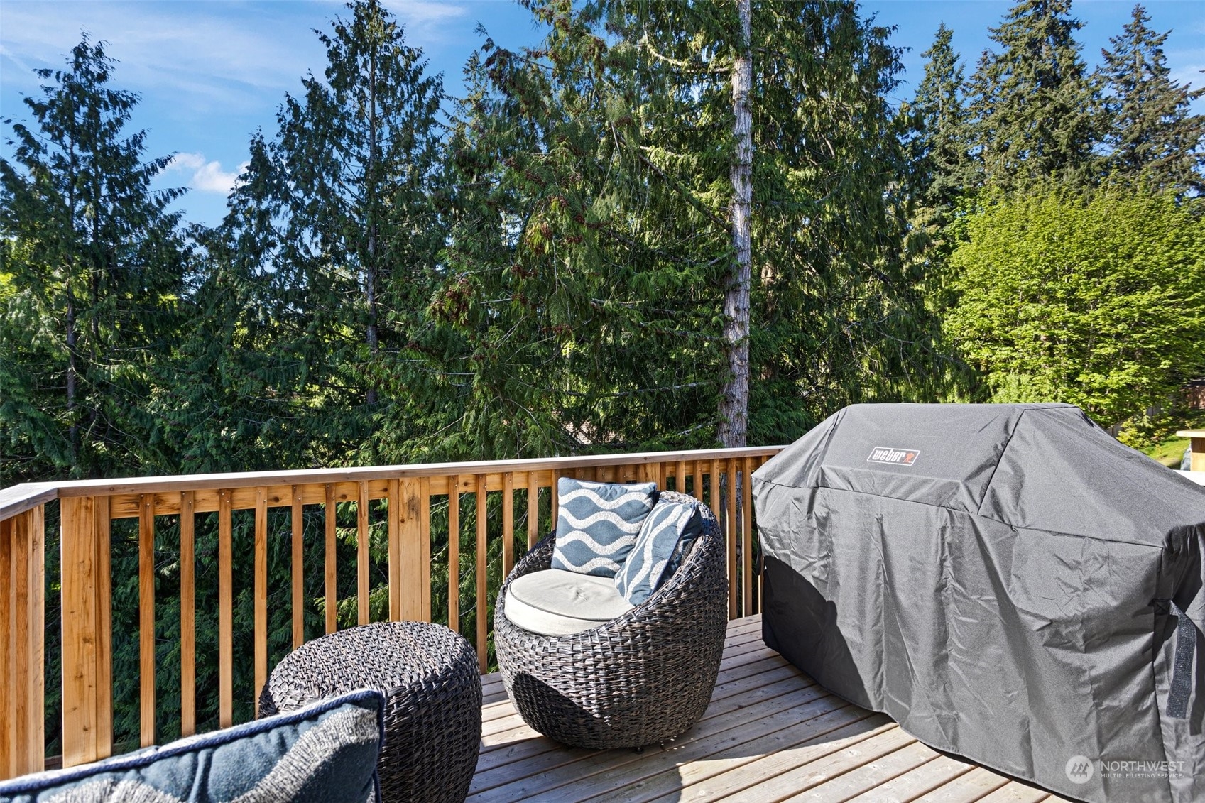 2124 229th Place Southwest Bothell, WA 98021 - Photo 25 of 37 a balcony with wooden floor and outdoor seating