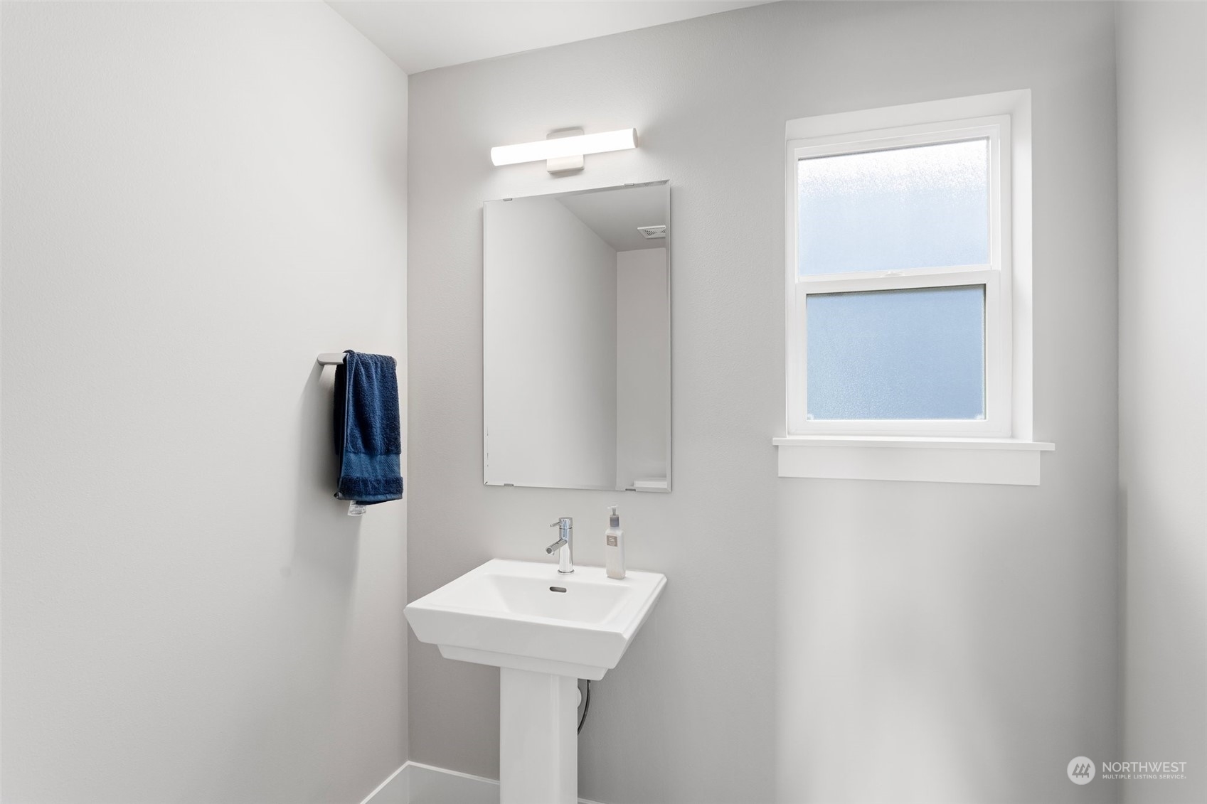 2124 229th Place Southwest Bothell, WA 98021 - Photo 26 of 37 a bathroom with a sink and mirror