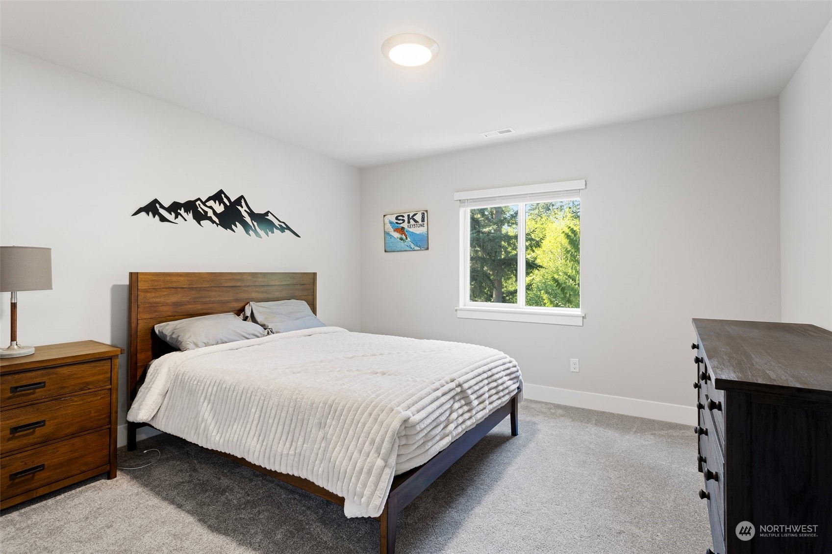 2124 229th Place Southwest Bothell, WA 98021 - Photo 29 of 37 a bedroom with a bed and window