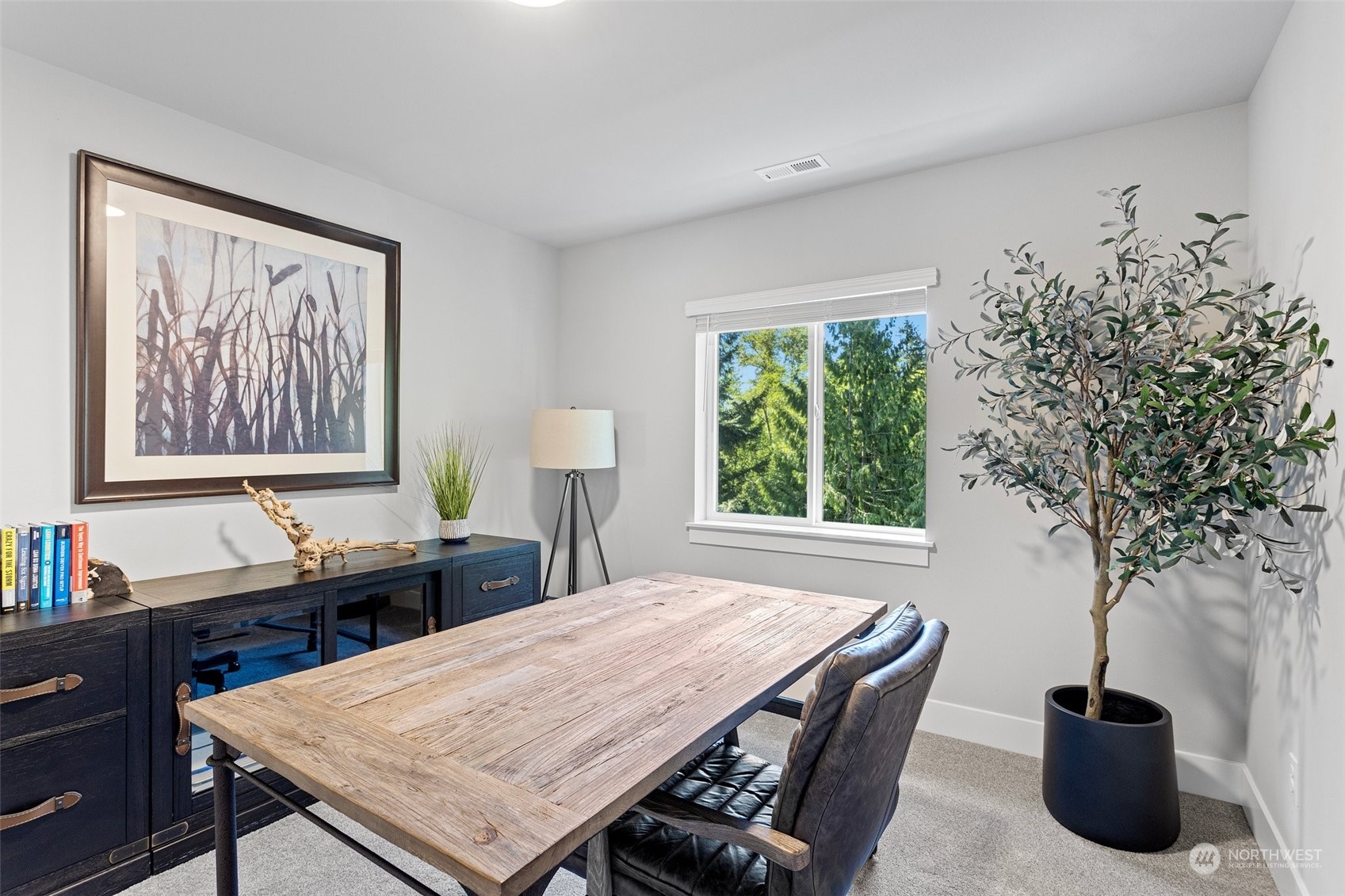 2124 229th Place Southwest Bothell, WA 98021 - Photo 34 of 37 a living room with furniture and a large window