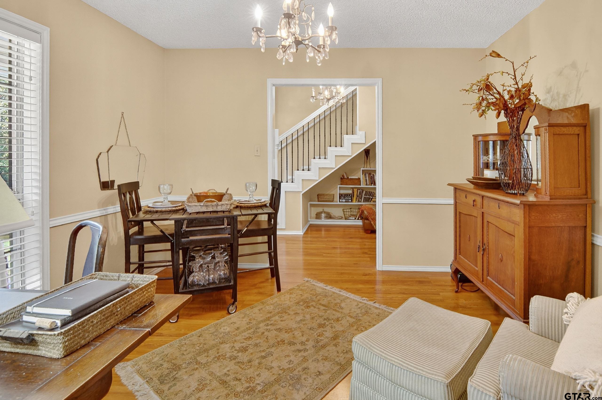 810 Jeanell Street Quitman, TX 75783 - Photo 19 of 37 a view of a livingroom with furniture and wooden floor