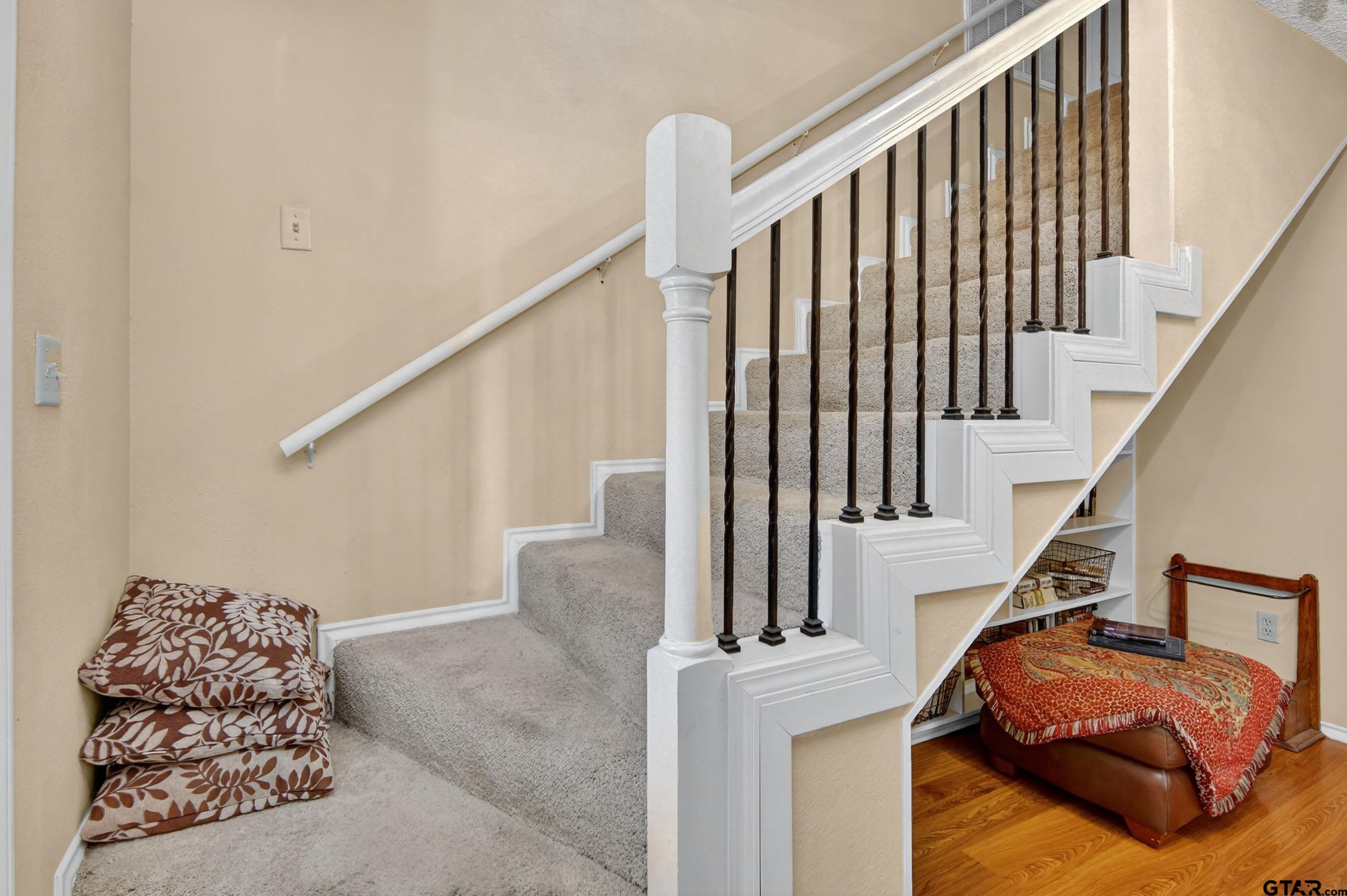 810 Jeanell Street Quitman, TX 75783 - Photo 24 of 37 a living room with furniture and stairs