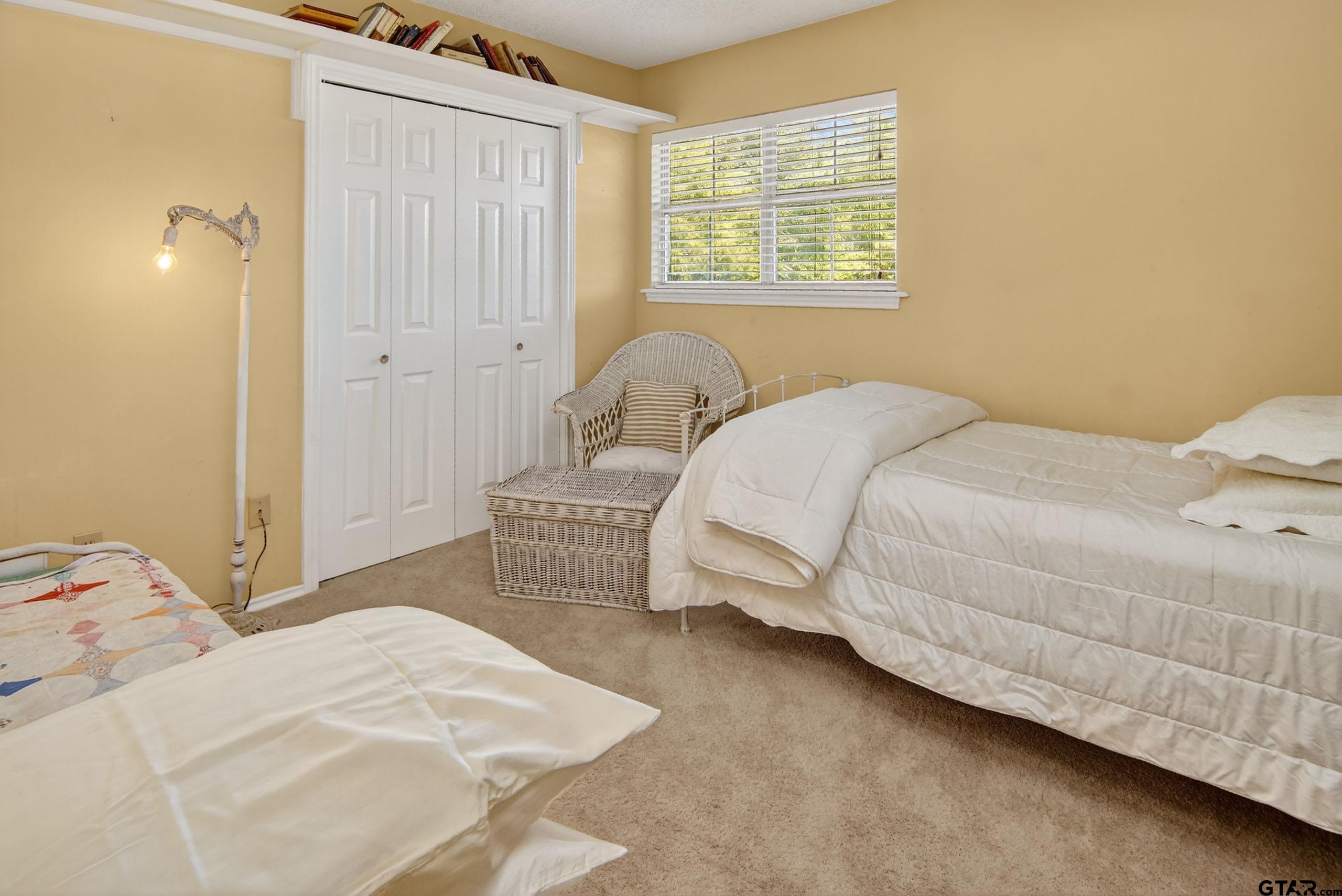 810 Jeanell Street Quitman, TX 75783 - Photo 26 of 37 a bedroom with a bed and a window