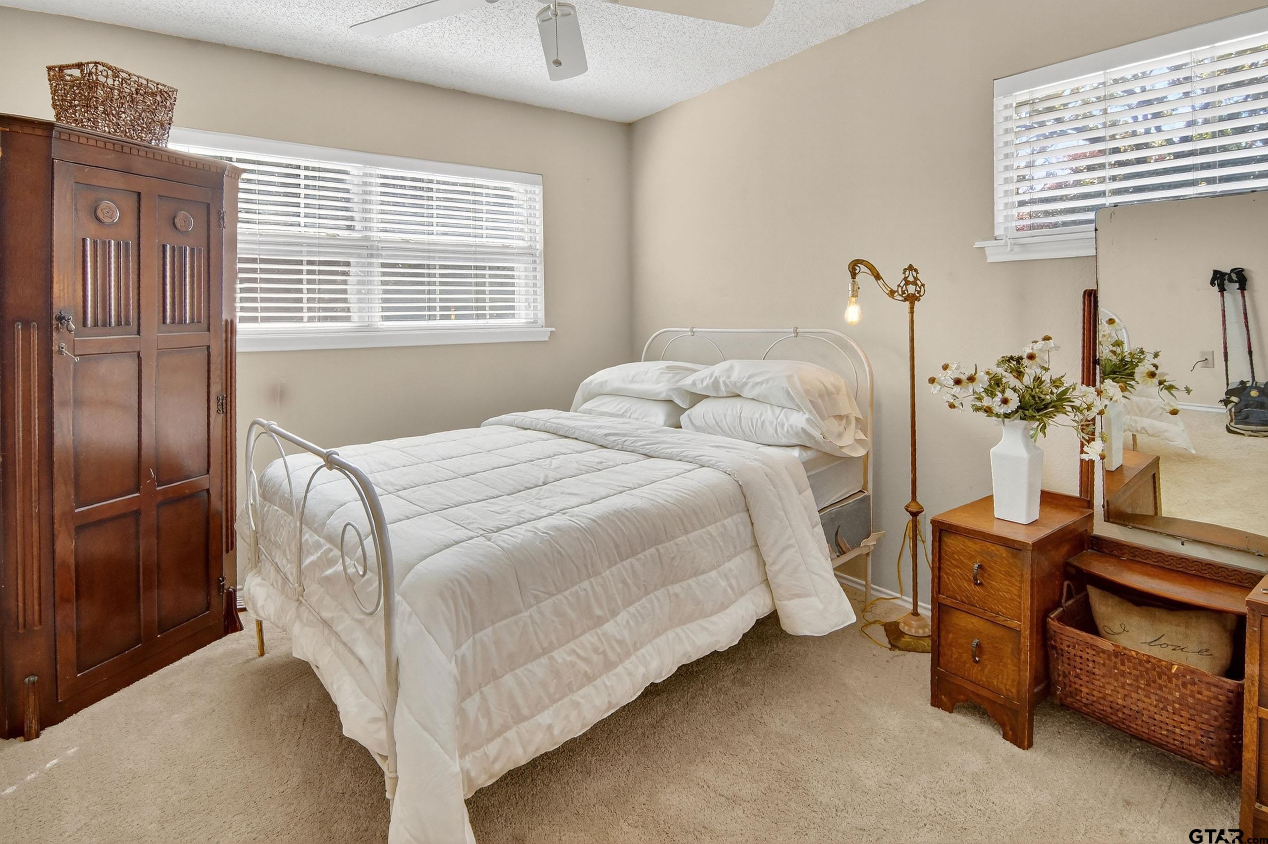 810 Jeanell Street Quitman, TX 75783 - Photo 27 of 37 a bedroom with a bed and a window