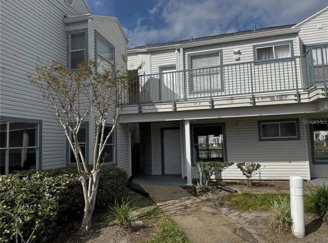 a house view with a outdoor space