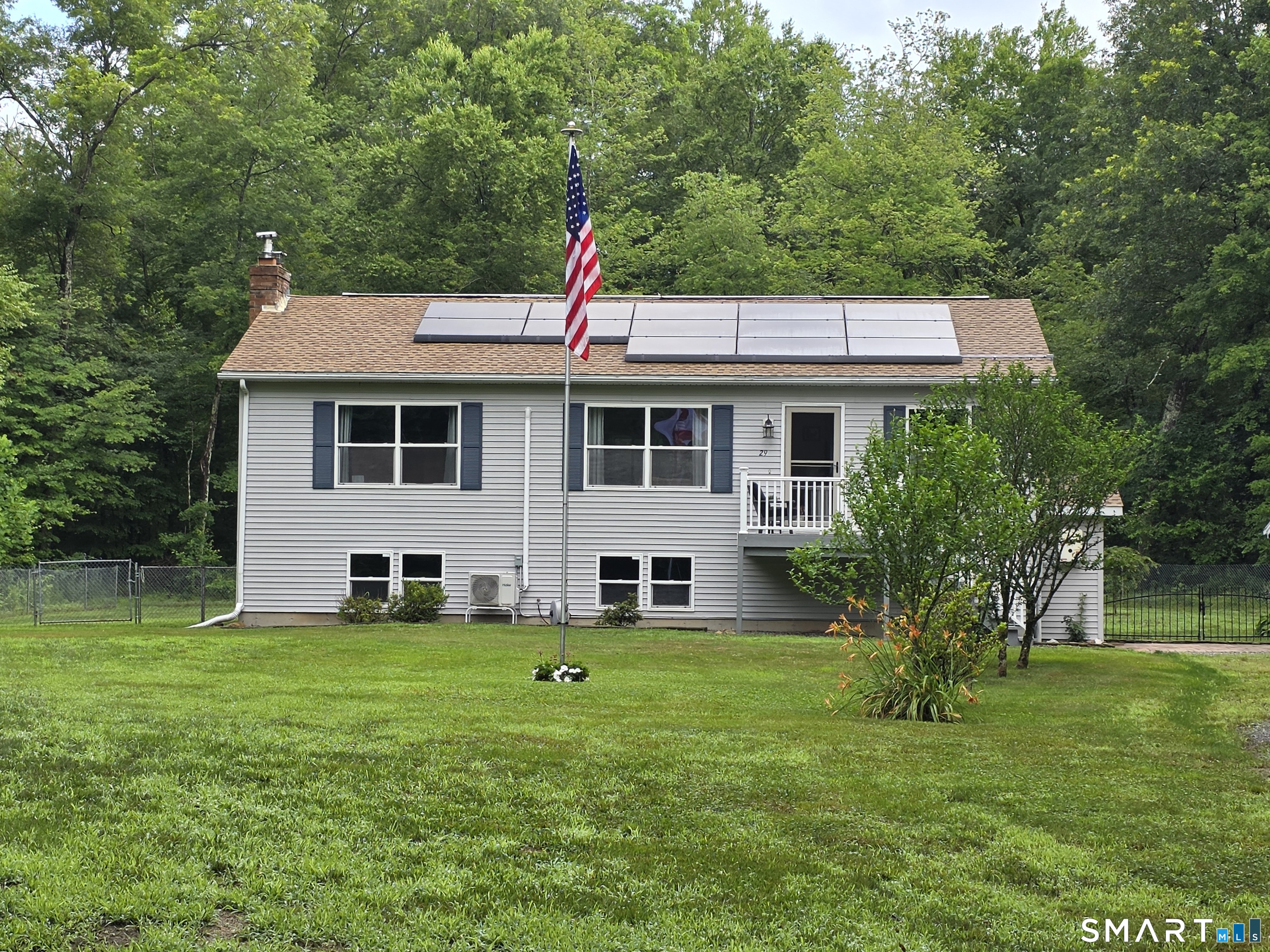 29 Bingham Road Canterbury, CT 06331 - Photo 1 of 40 a front view of house with yard and green space