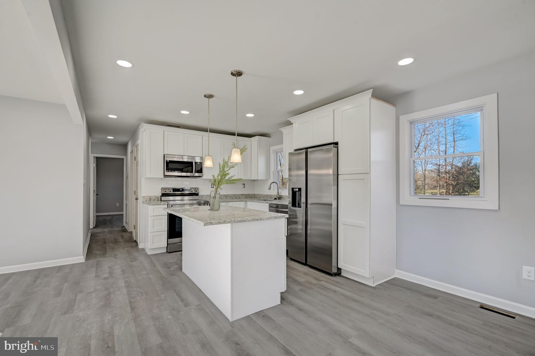 13393 Dahlgren Road King George, VA 22485 - Photo 21 of 22 barconcept great room with breakfast