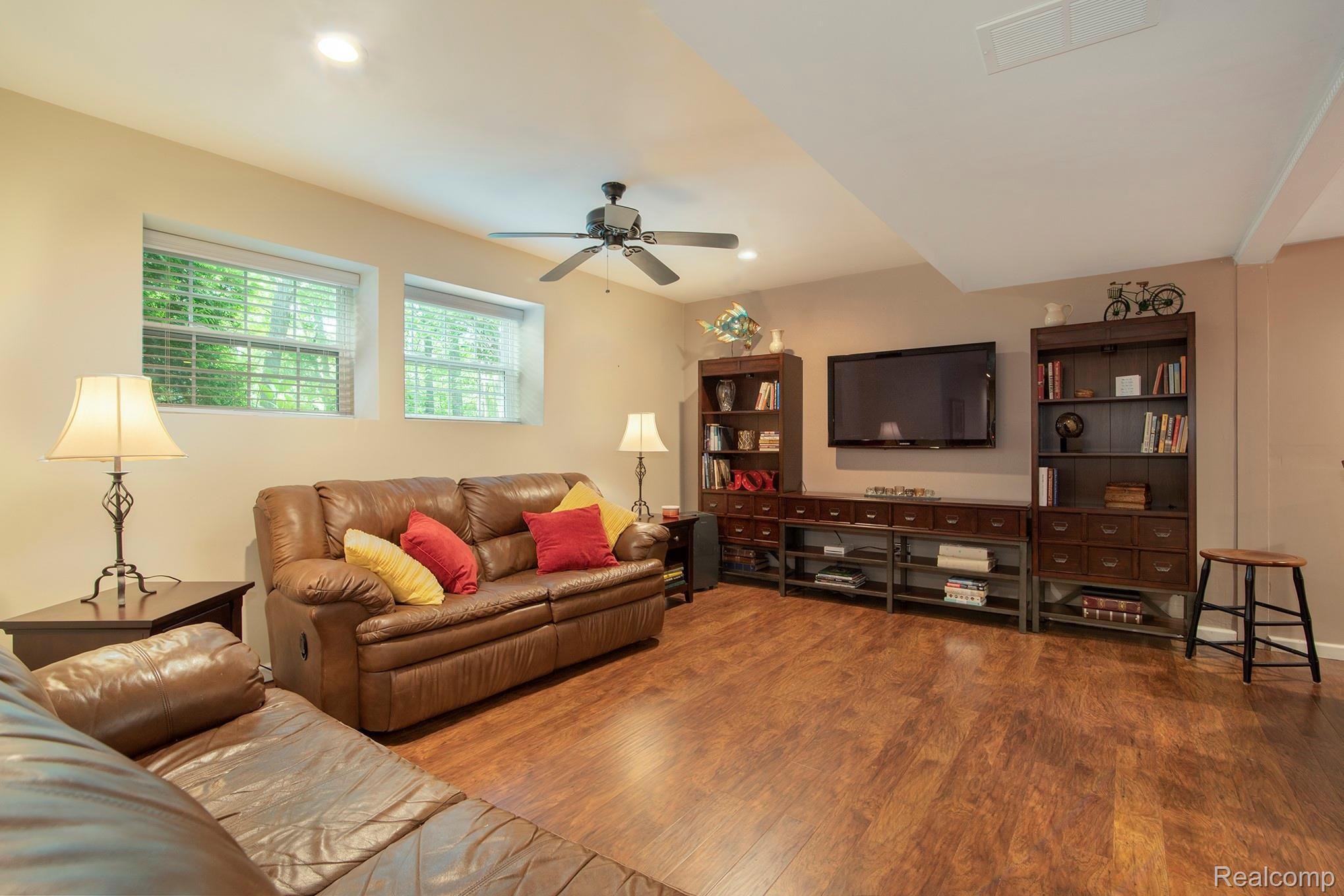 2524 Ravine Side North Howell, MI 48843 - Photo 25 of 31 basement rec room with daylight windows