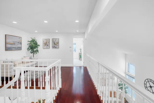 a view of entryway with wooden floor