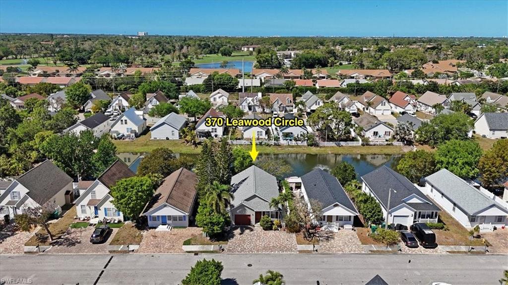370 Leawood Circle Naples, FL 34104 - Photo 29 of 31 an aerial view of multiple house