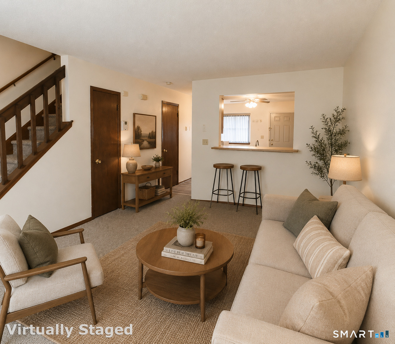 975 Meriden Road, Unit 101 Waterbury, CT 06705 - Photo 5 of 28 a living room with furniture and a potted plant