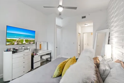 a view of a bathroom with a glass door shower