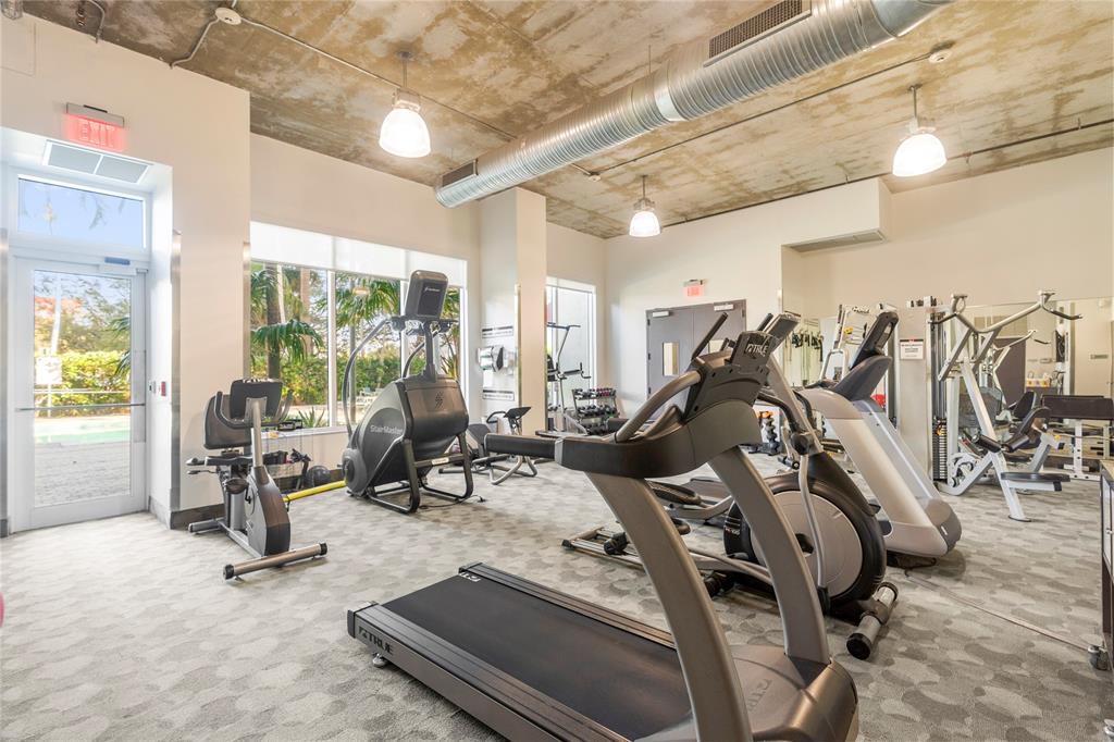 313 Northeast 2nd Street, Unit 405 Fort Lauderdale, FL 33301 - Photo 36 of 49 a view of a room with gym equipment