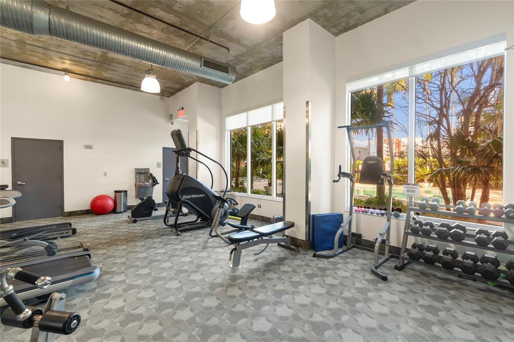 313 Northeast 2nd Street, Unit 405 Fort Lauderdale, FL 33301 - Photo 37 of 49 a view of a room with gym equipment