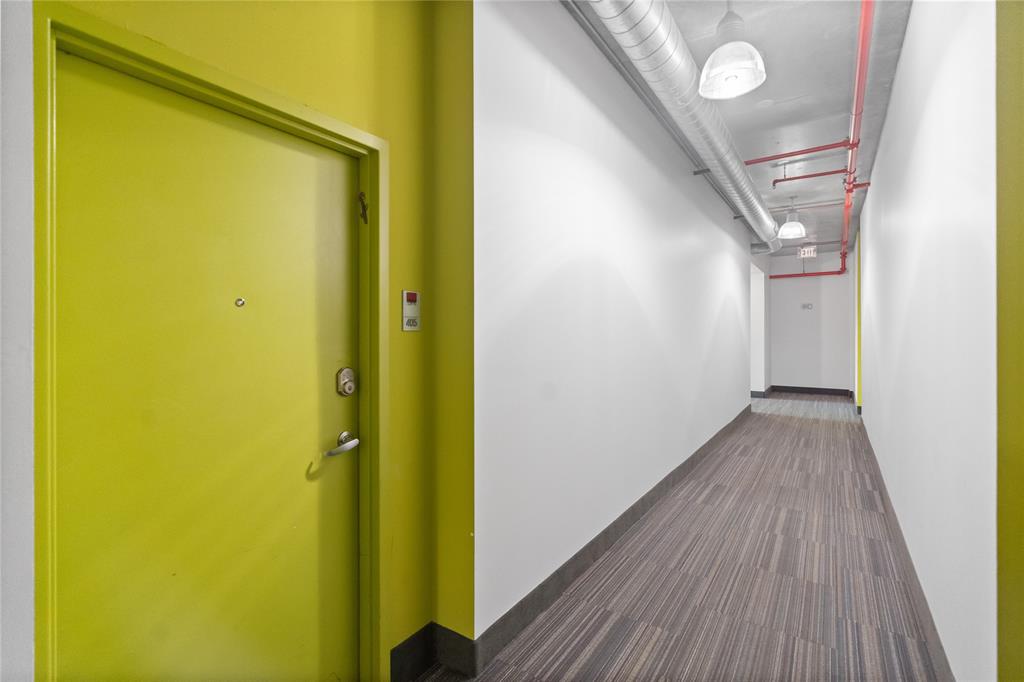 313 Northeast 2nd Street, Unit 405 Fort Lauderdale, FL 33301 - Photo 6 of 49 a view of a hallway with wooden floor