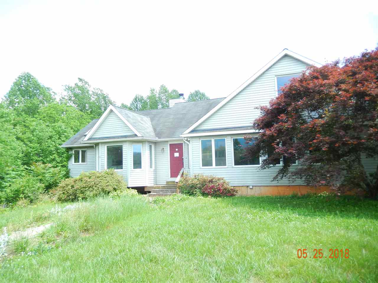 1338 Amicus Road Stanardsville, VA 22973 - Photo 1 of 33 a front view of house with yard and green space