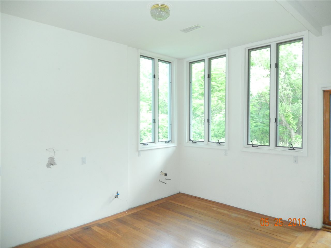 1338 Amicus Road Stanardsville, VA 22973 - Photo 25 of 33 an empty room with wooden floor and windows