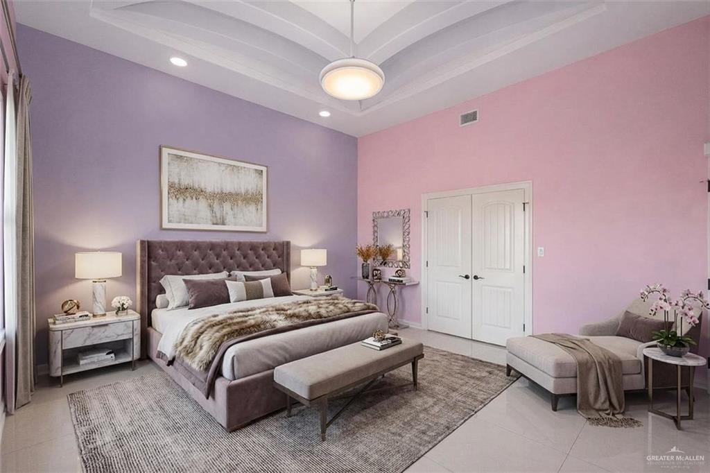 1339N North FM 649 Rio Grande City, TX 78582 - Photo 13 of 37 a bedroom with a bed and a chandelier