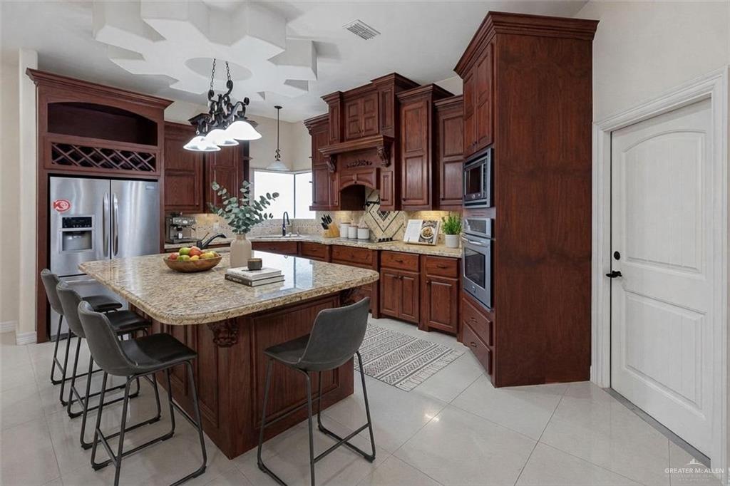 1339N North FM 649 Rio Grande City, TX 78582 - Photo 15 of 37 a kitchen with a table and chairs in it