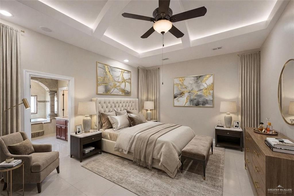 1339N North FM 649 Rio Grande City, TX 78582 - Photo 18 of 37 a spacious bedroom with a bed a couch and a chandelier