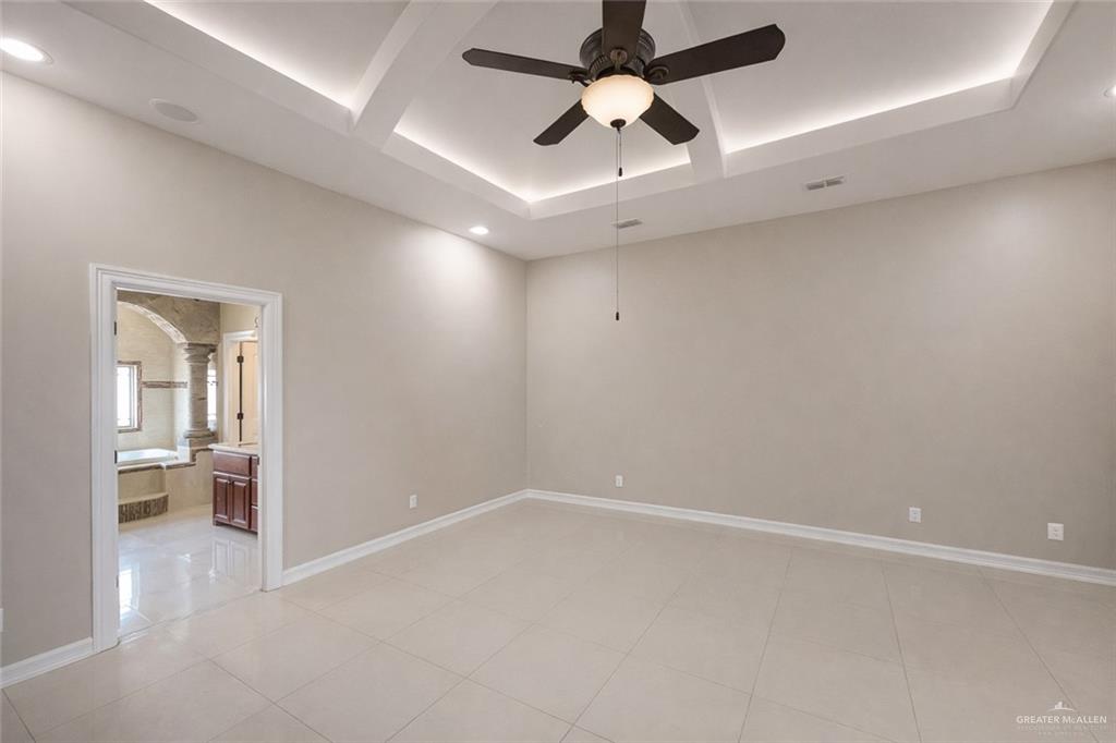 1339N North FM 649 Rio Grande City, TX 78582 - Photo 33 of 37 en empty room with ceiling fan and window