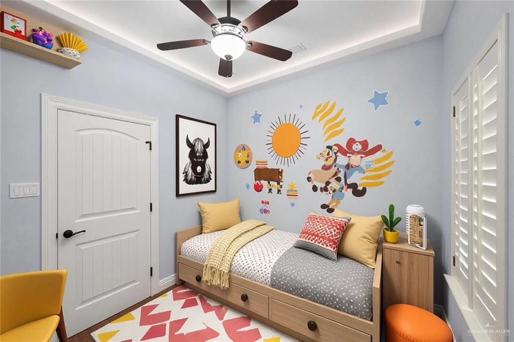 1339N North FM 649 Rio Grande City, TX 78582 - Photo 7 of 37 a bedroom with a bed and a painting on the wall