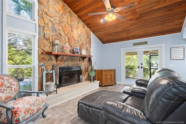 a bedroom with a bed and a fireplace