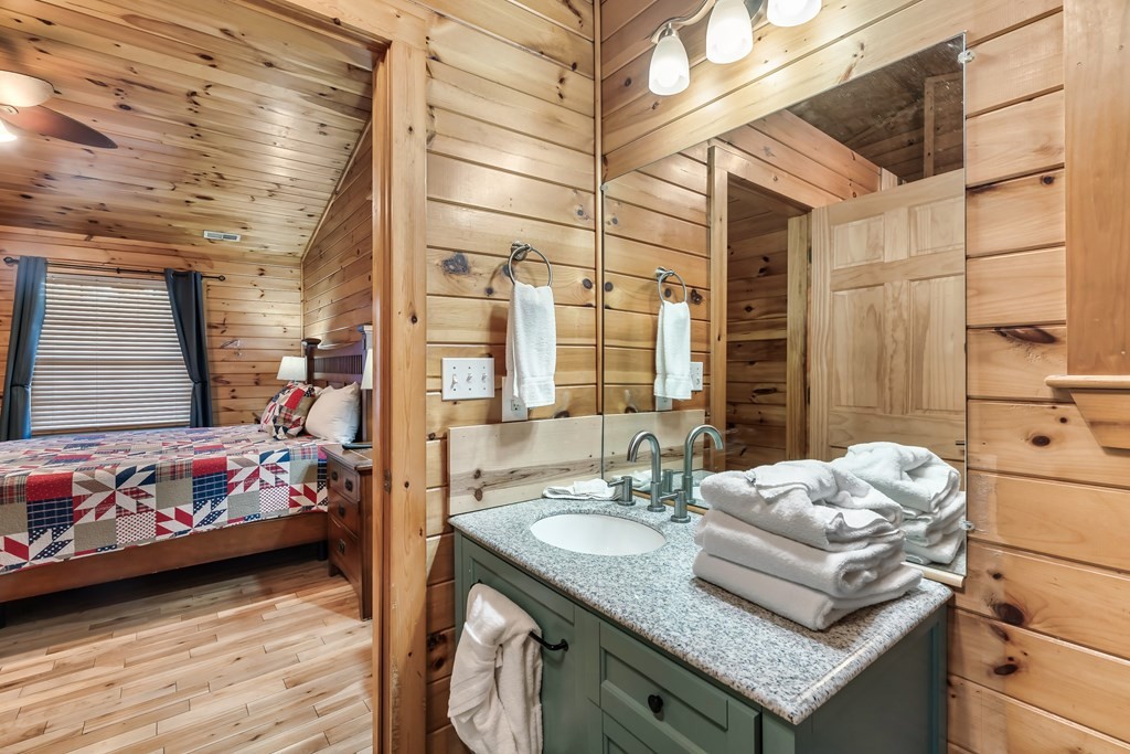 2617 Sharpes Ridge Way Sevierville, TN 37876 - Photo 28 of 43 a bedroom with furniture and a window