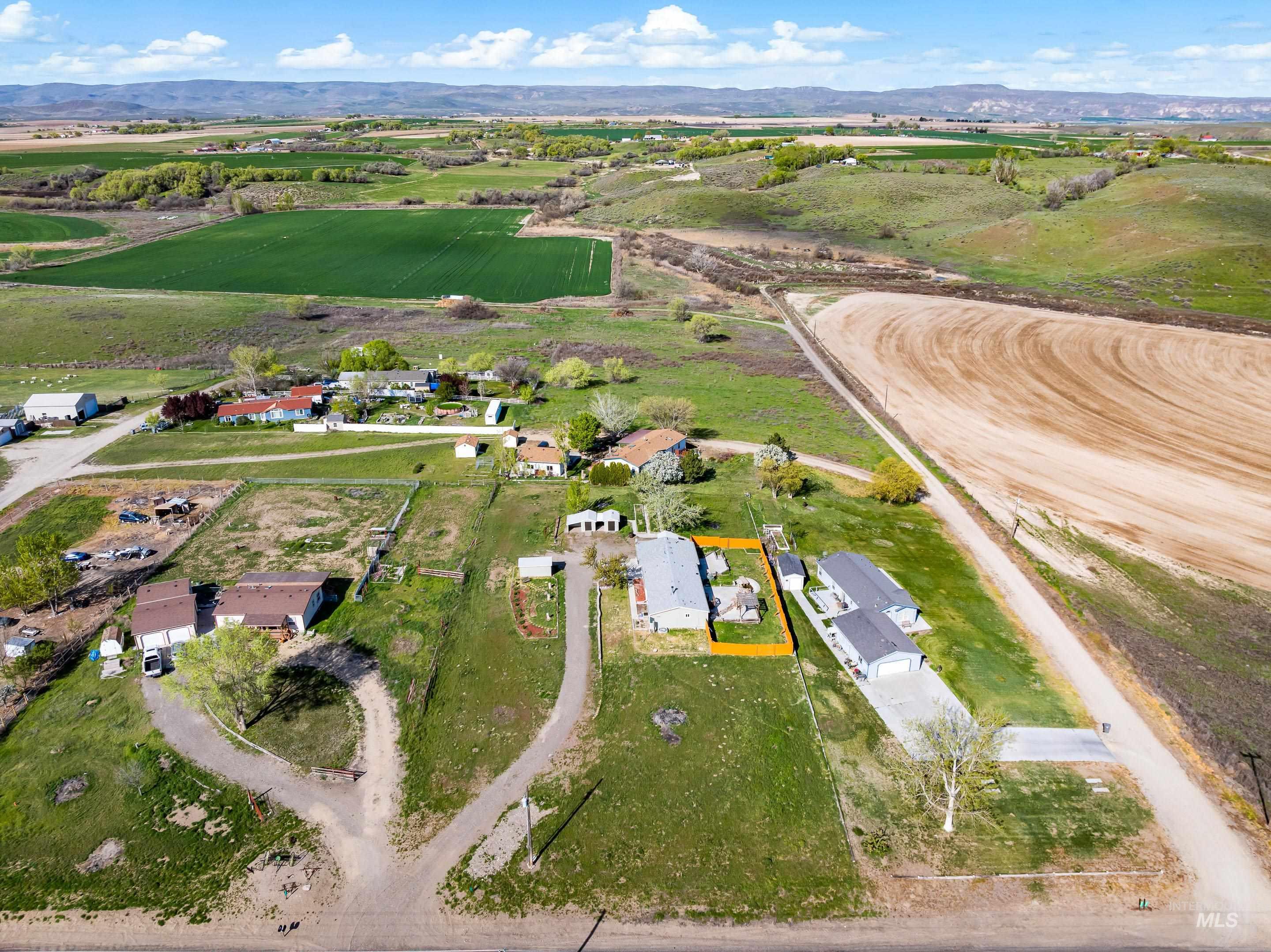 2427 Northside Road Homedale, ID 83628 - Photo 45 of 49 Overview of rural landscape with mountains and large plots for crops