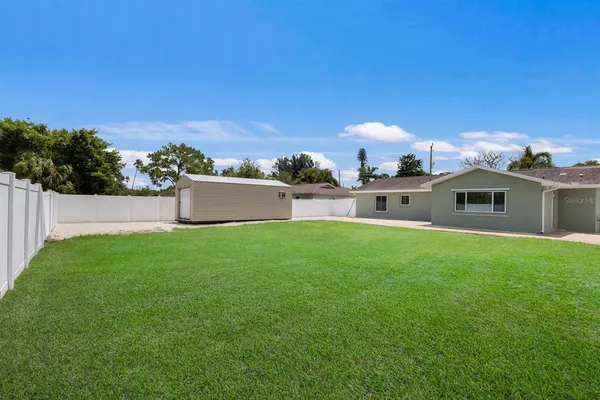 a house view with a garden space
