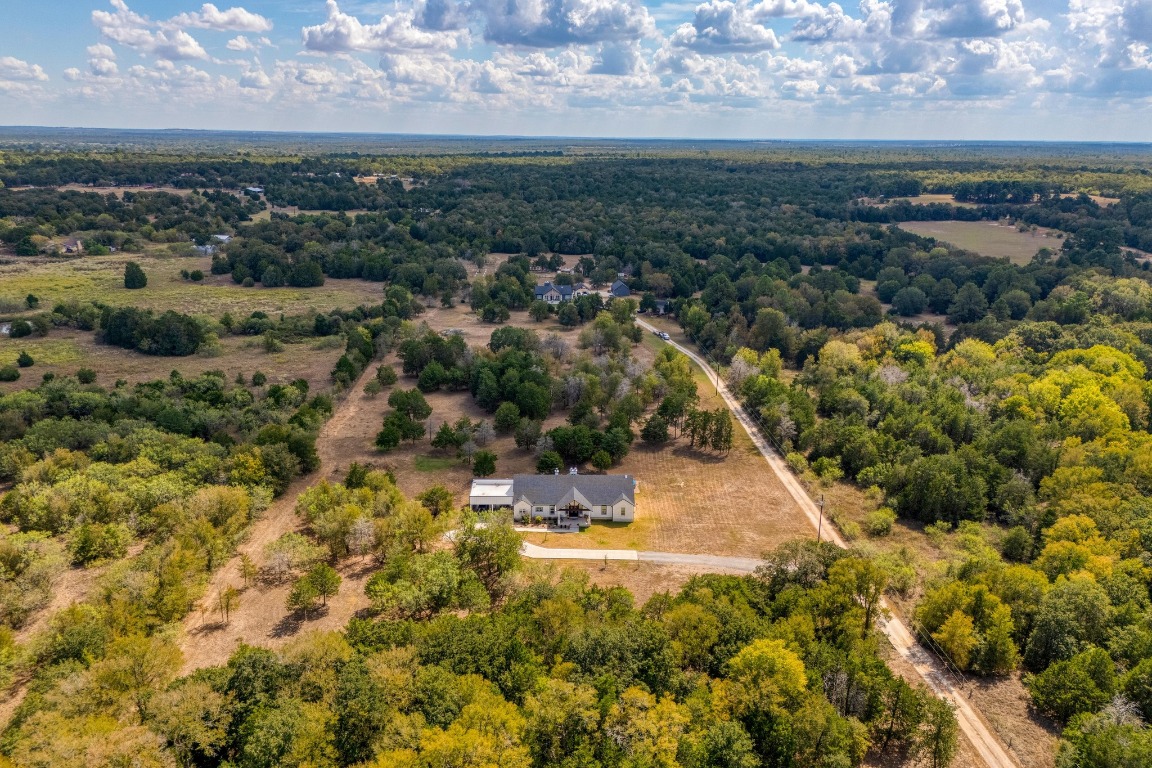 1901 Highway 21, Unit B Paige, TX 78659 - Photo 35 of 40 an aerial view of residential houses with outdoor space