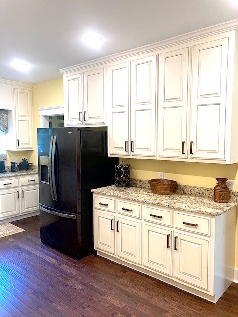 61 Spring Valley Road Taft, TN 38488 - Photo 17 of 29 a kitchen with granite countertop a refrigerator stove top oven and sink