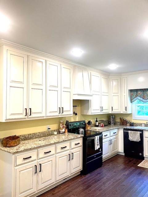 61 Spring Valley Road Taft, TN 38488 - Photo 18 of 29 a kitchen with granite countertop white cabinets and white appliances